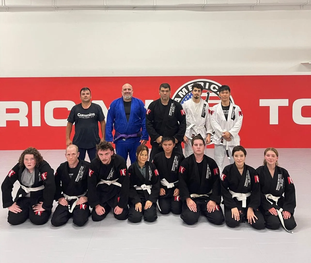 Adults showing confidence during a martial arts class