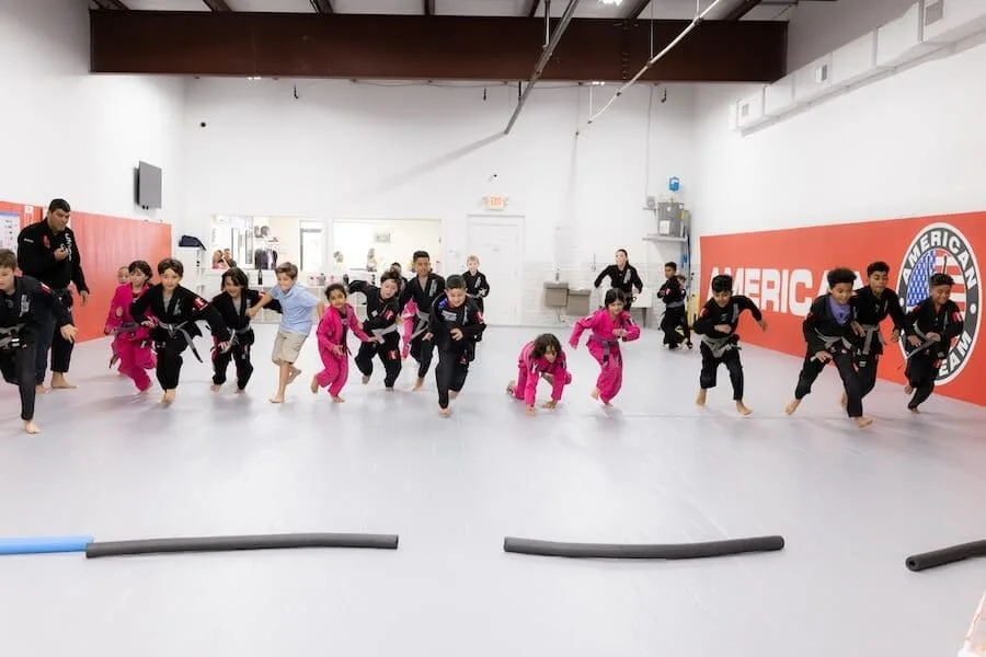 students experiencing benefits of kids martial arts basics