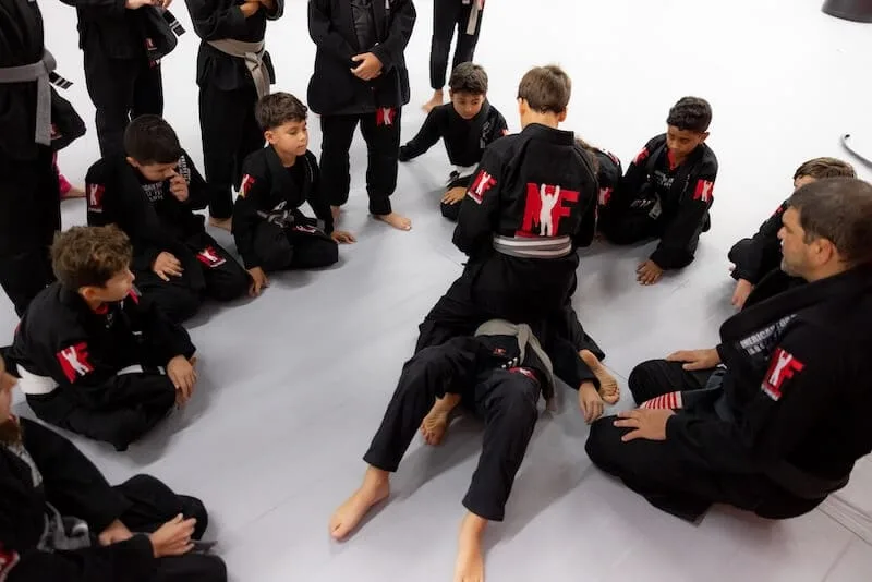 children learning benefits of kids martial arts in a dojo