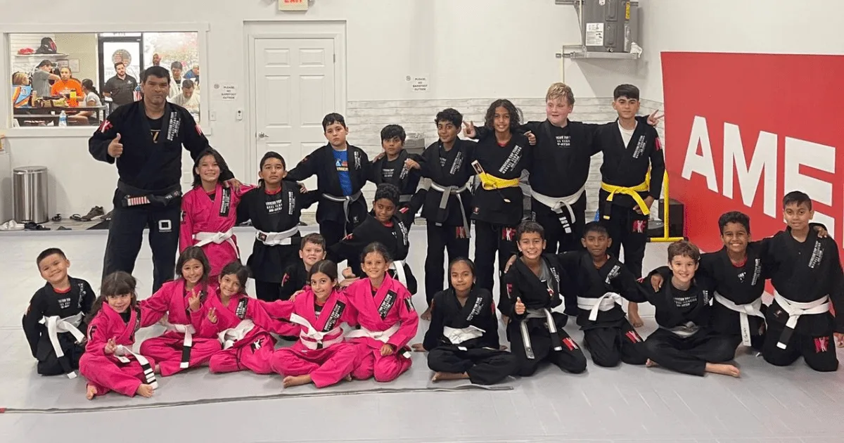 Kids practicing BJJ gain core strength and mental health benefits like discipline and confidence.